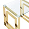 close up of glass coffee table corner and legs gold