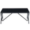 side view of a black glass coffee table with geometric legs