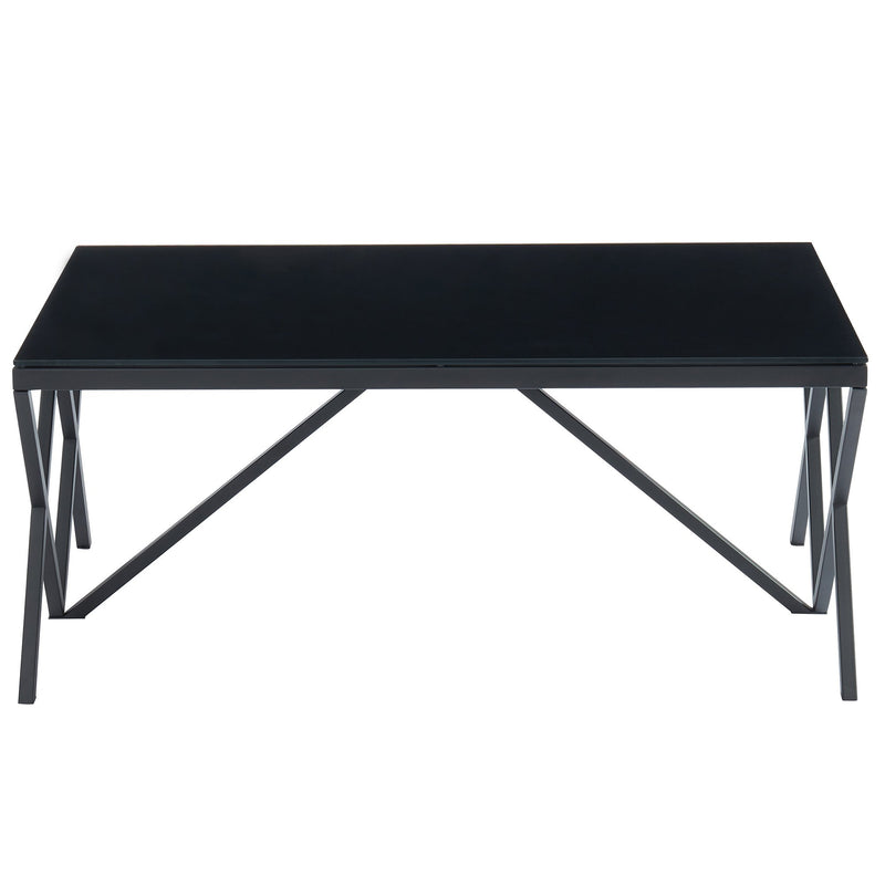 side view of a black glass coffee table with geometric legs