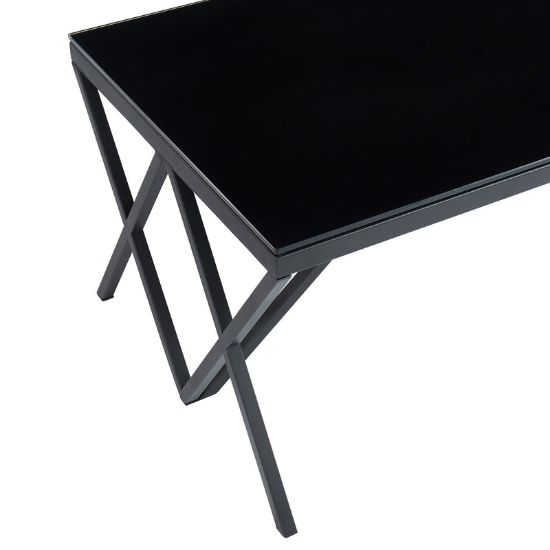 close of of black glass coffee table corner